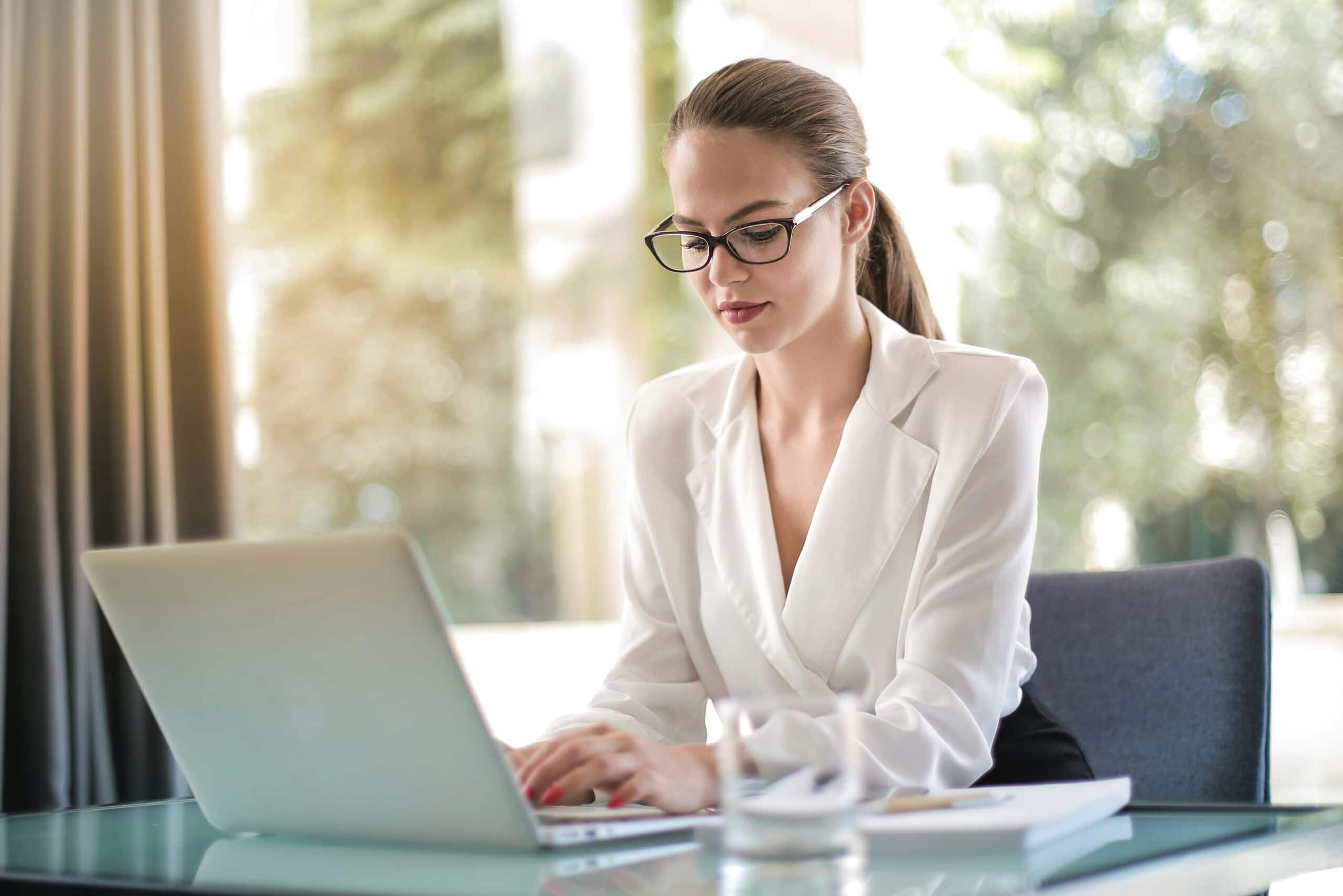 woman sitting at a desk
